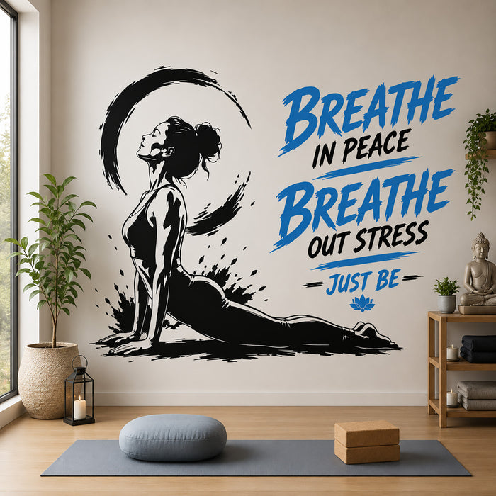 Breathe In Peace Breathe Out Stress yoga wall sticker featuring a woman performing Cobra Pose with calming blue lettering in a modern yoga studio.