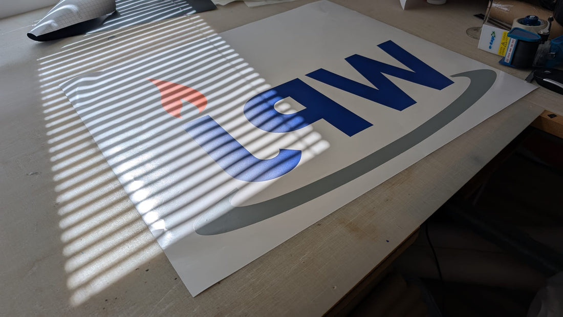 Custom Window Logo Installation for WPJ Heating