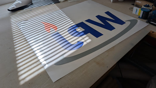 Custom Window Logo Installation for WPJ Heating
