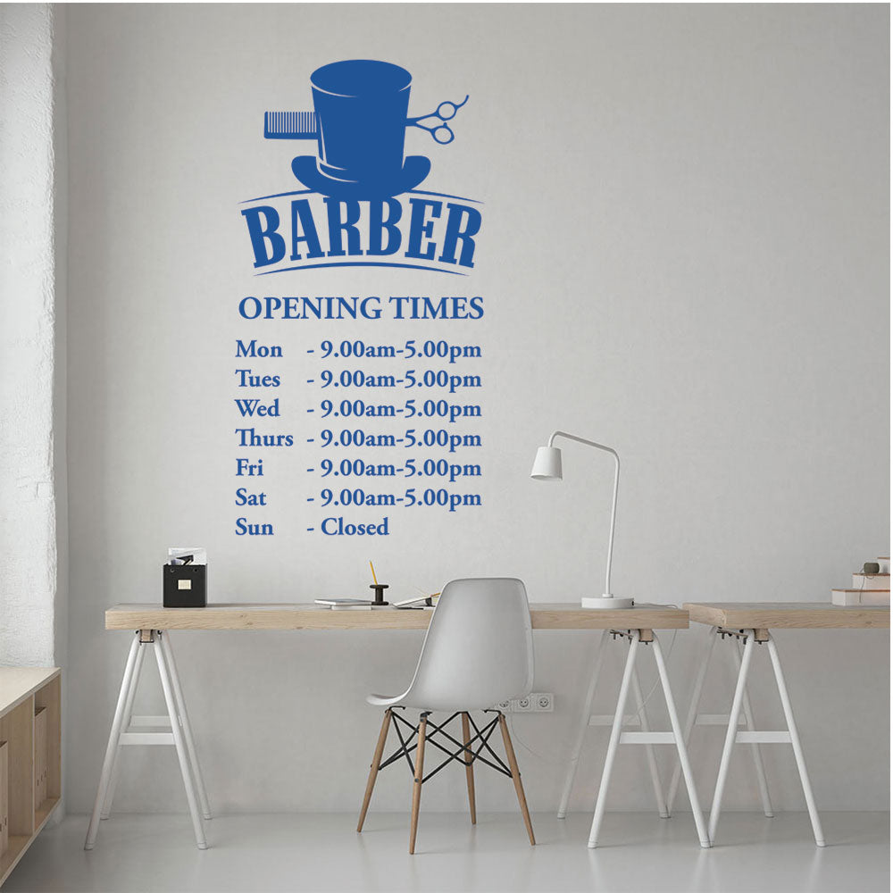 barbershop decal on a wall showing opening times