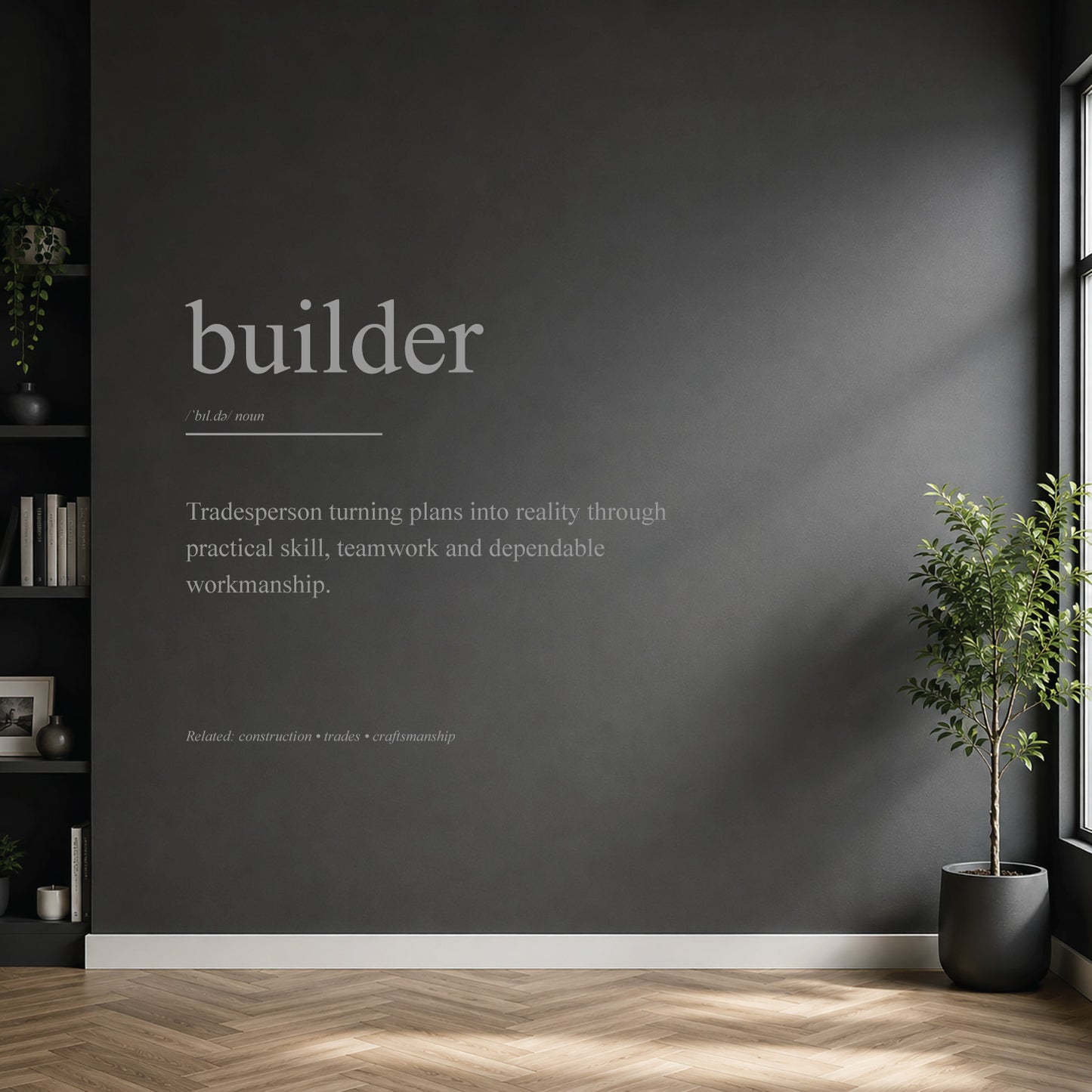 White builder definition wall sticker on a dark modern wall.