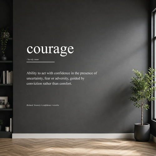 White courage definition wall sticker on a dark modern wall.