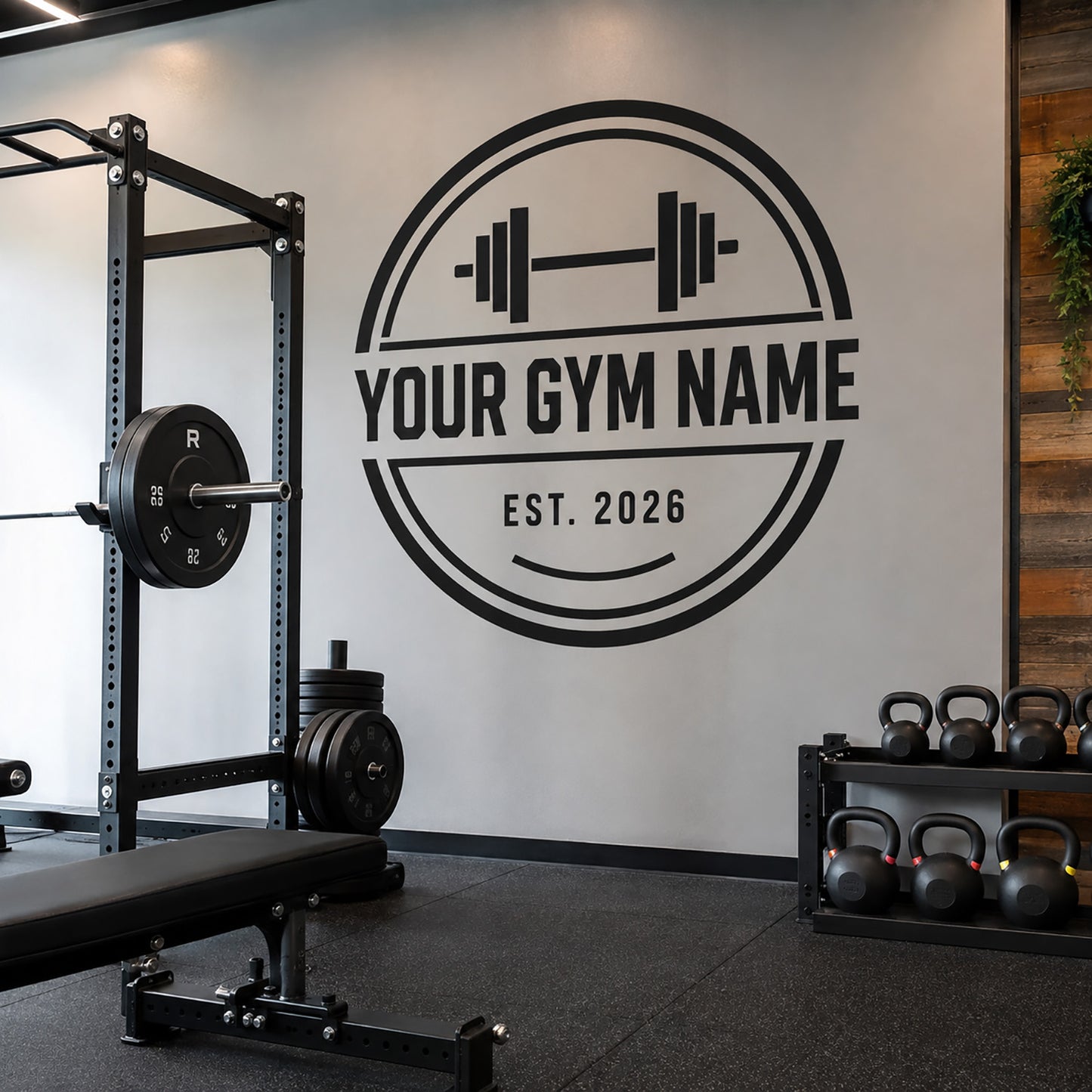 Custom gym logo wall sticker displayed in a modern fitness studio