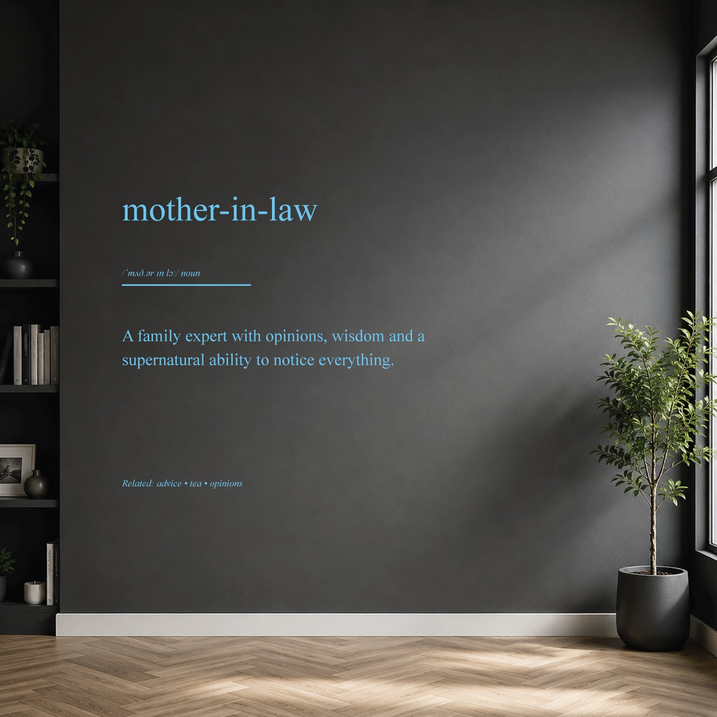 White mother-in-law dictionary definition wall sticker on a dark modern wall.