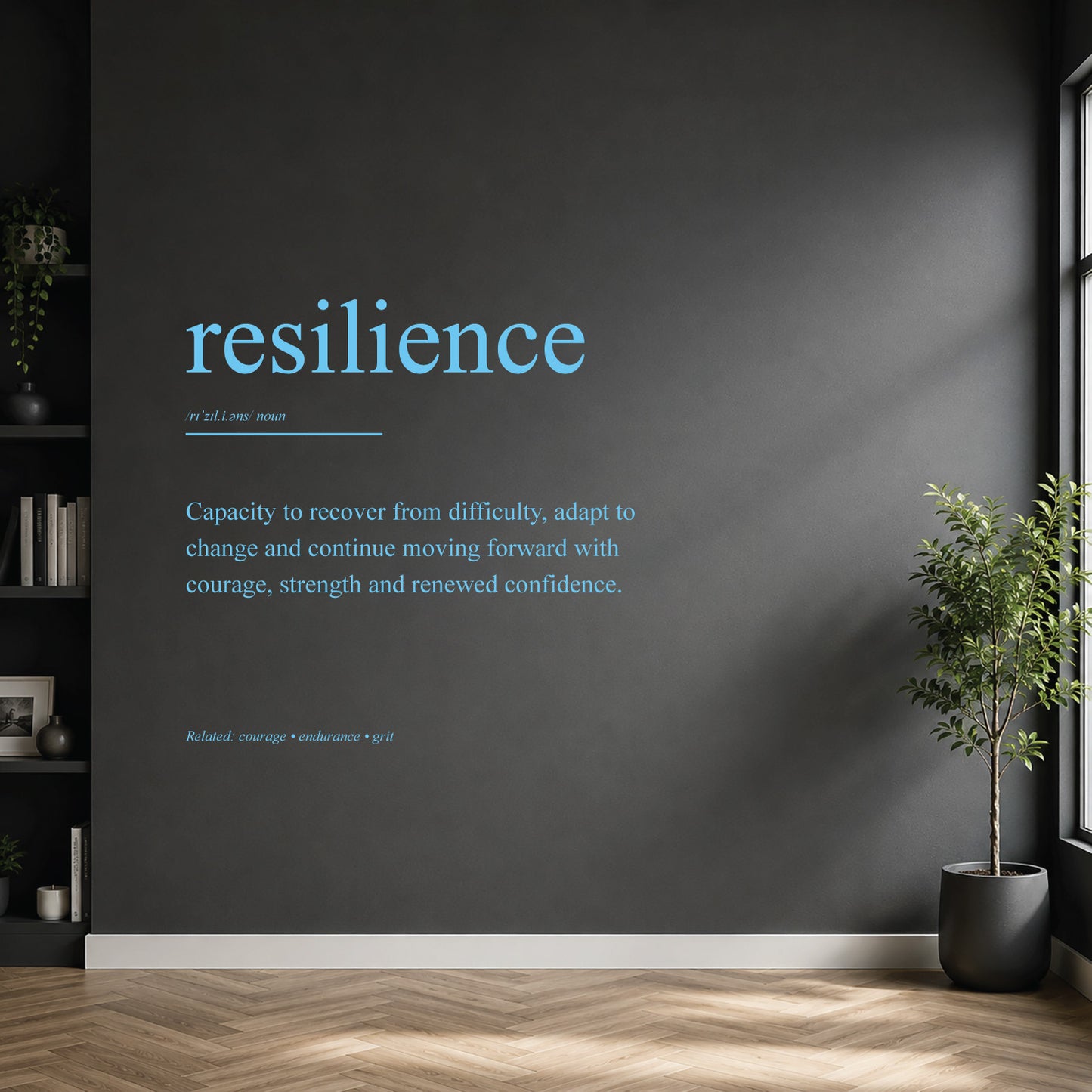 White resilience definition wall sticker on a dark modern wall.