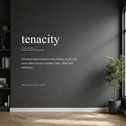 White tenacity definition wall sticker on a dark modern wall.